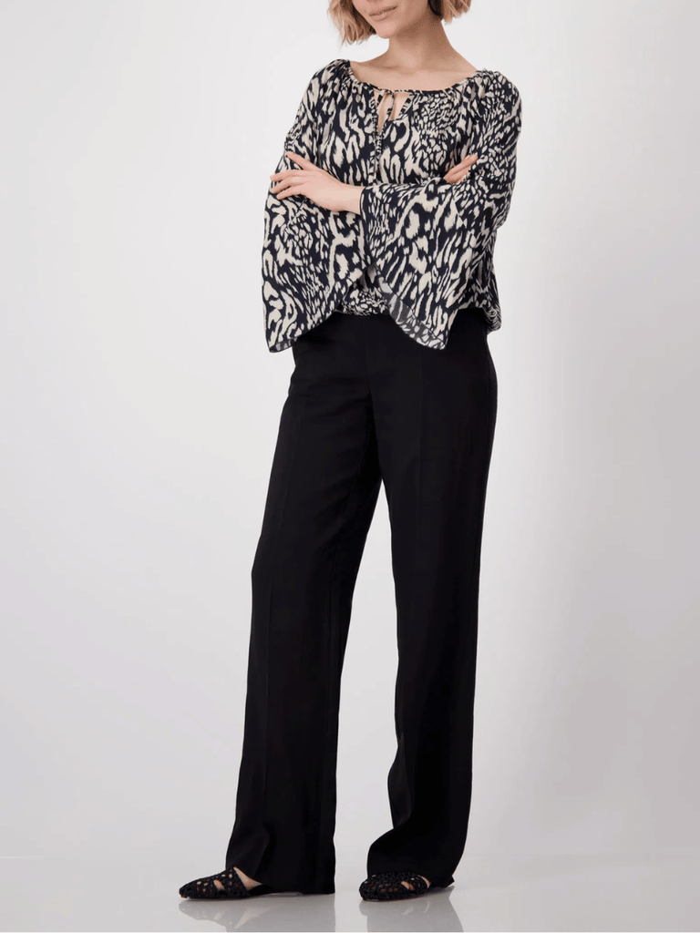 Monari Long Sleeve Tie Neck Animal Print Blouse in Black and Beige Discover the Elegant Monari Collection at Signature of Double Bay, Shop Stylish Knitwear, Dresses, and Tops Online from Sydney's Premier Mature Fashion Boutique