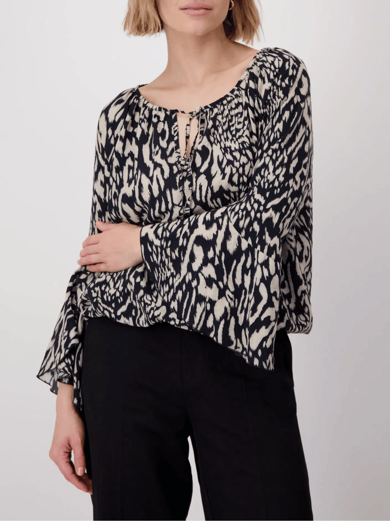 Monari Long Sleeve Tie Neck Animal Print Blouse in Black and Beige Discover the Elegant Monari Collection at Signature of Double Bay, Shop Stylish Knitwear, Dresses, and Tops Online from Sydney's Premier Mature Fashion Boutique