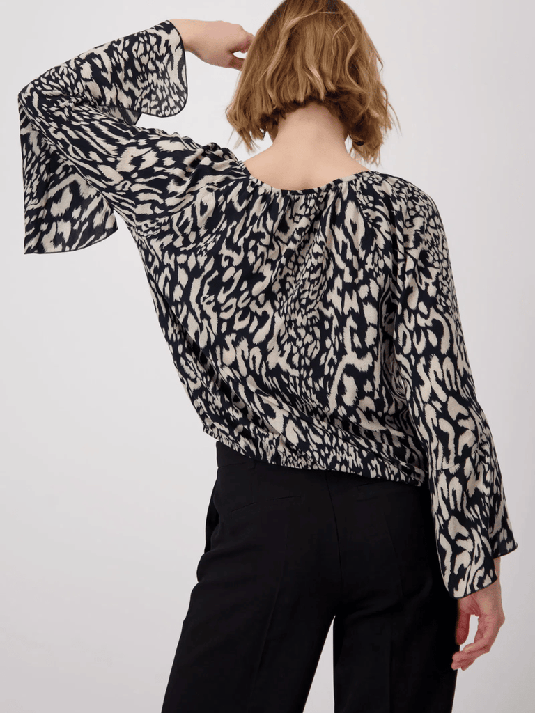 Monari Long Sleeve Tie Neck Animal Print Blouse in Black and Beige Discover the Elegant Monari Collection at Signature of Double Bay, Shop Stylish Knitwear, Dresses, and Tops Online from Sydney's Premier Mature Fashion Boutique