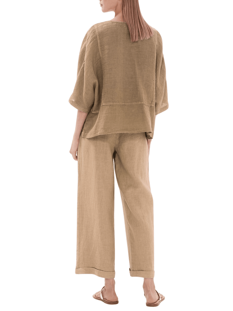 Haris Cotton Round Neck Linen Gauze Blouse with Batwing Sleeve in Beach Sand Shop Haris Cotton Australia – Elegant linen clothing and sustainable european women’s fashion at Signature of Double Bay Sydney online and instore. shop natural linen dresses, white linen clothing and summer linen outfits in Sydney