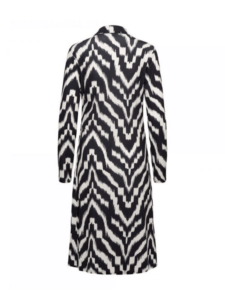 &Co Woman Netherlands V Neck Midi Lessy Dress in Black and Cream Ikat Print Online Stockist &co woman travel wear travel clothing online sydney australia lightweight easy care wardrobe essentials