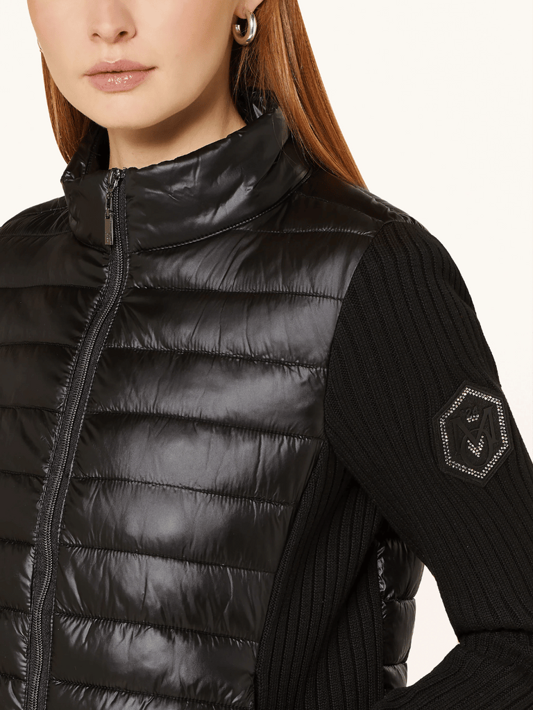 Monari Knitted Sleeve Quilted Jacket in Black Discover the Elegant Monari Collection at Signature of Double Bay, Shop Stylish Knitwear, Dresses, and Tops Online from Sydney's Premier Mature Fashion Boutique