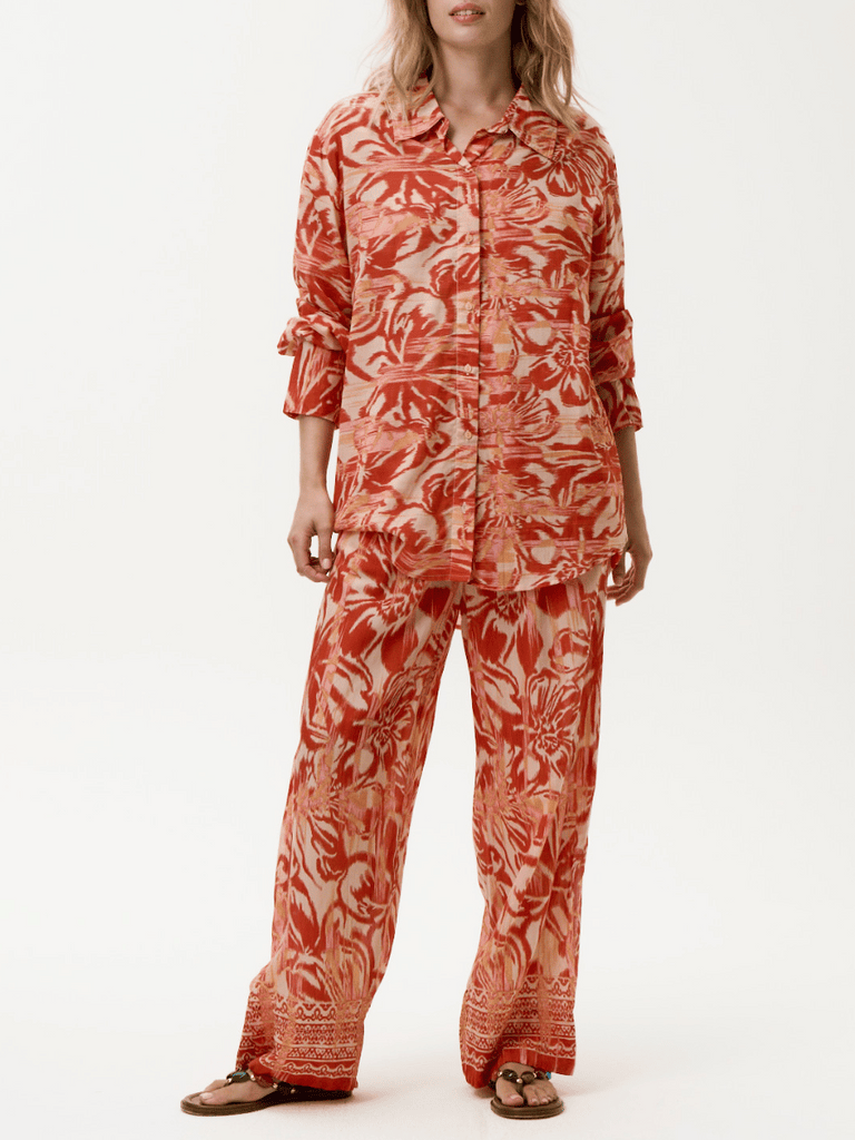 Oneseason Long Relaxed Isla Pant in Red and Orange Print Oneseason One Season lightweight and stylish resort wear Australian fashion label official stockist Signature of Double Bay